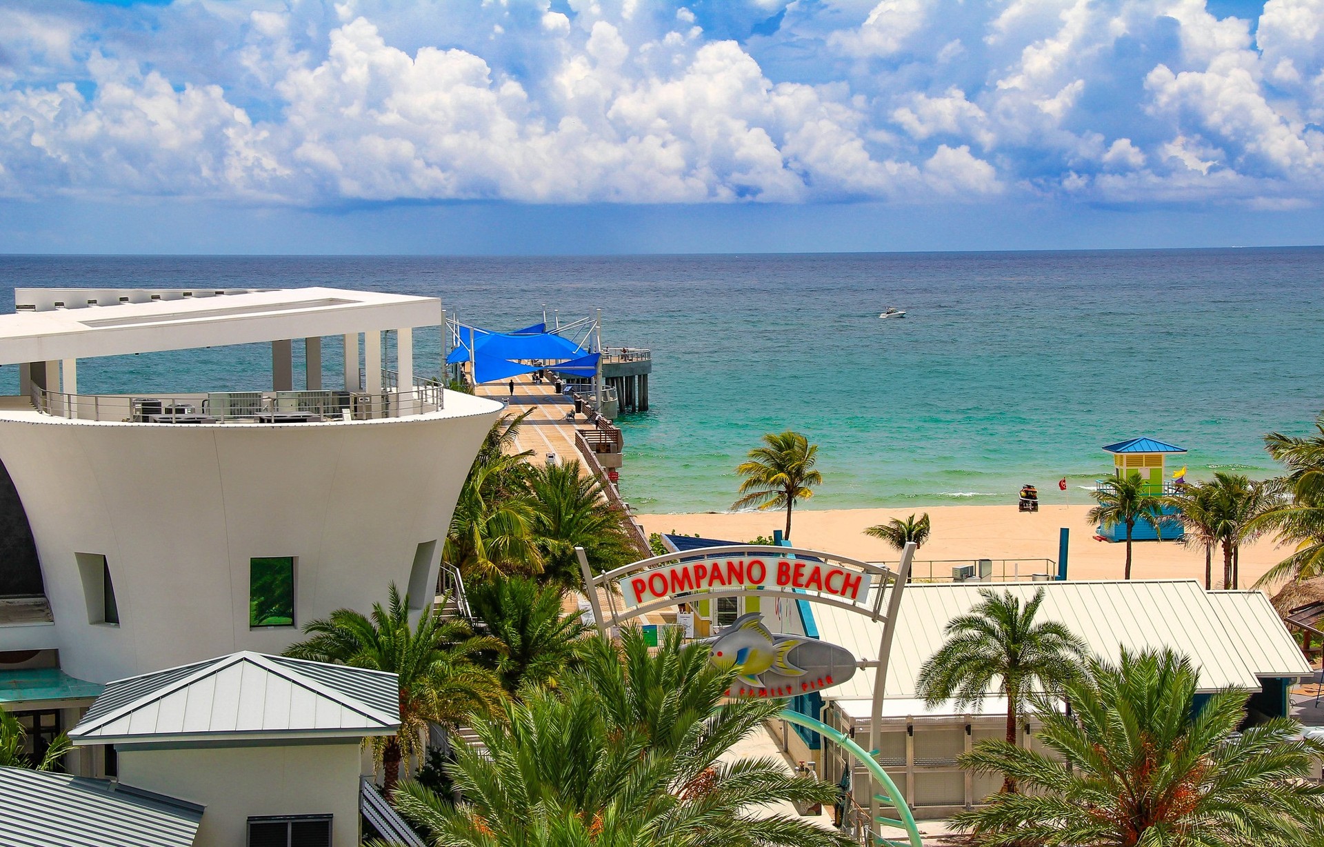 Pompano Beach and the rebuilt Fisher Family Pier with blue shade canopies